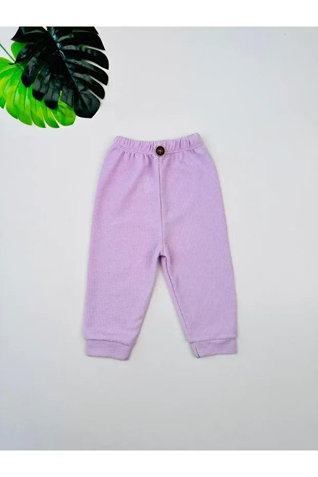 Ensemble de 4 Pantalons pour Nouveau-né Doux et Tendance - Image 7